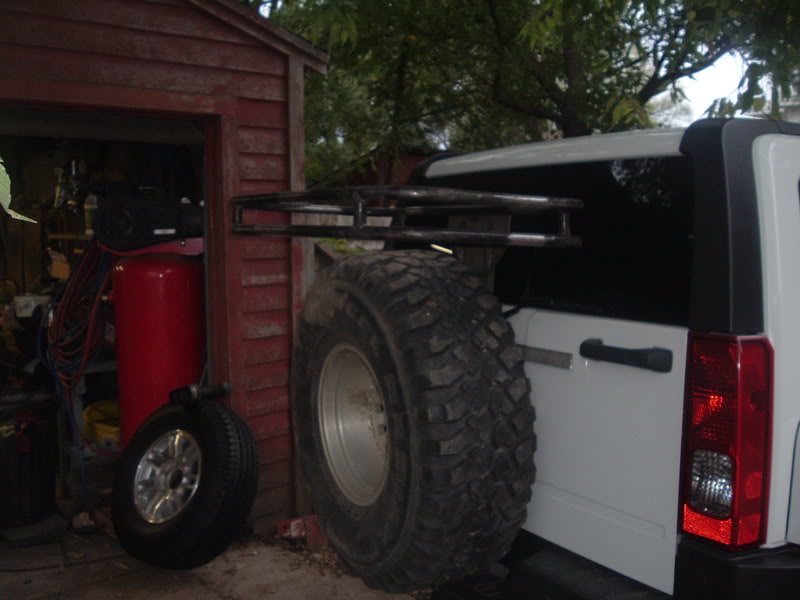 Name:  sparetirerack2009.jpg
Views: 404
Size:  51.1 KB
